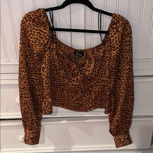 worn once cheetah print shirt